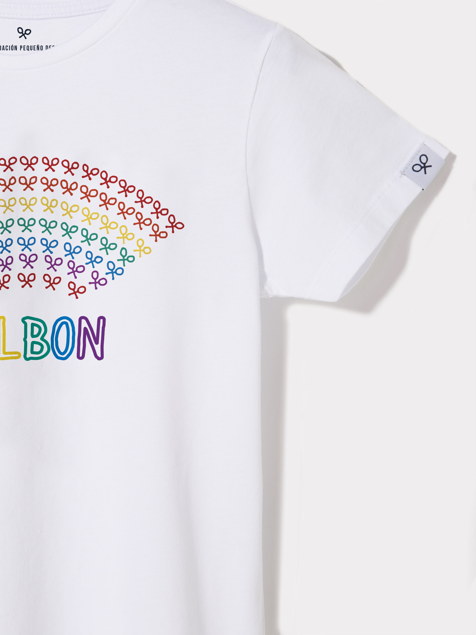 Camiseta kids arcoiris detalle solidaria